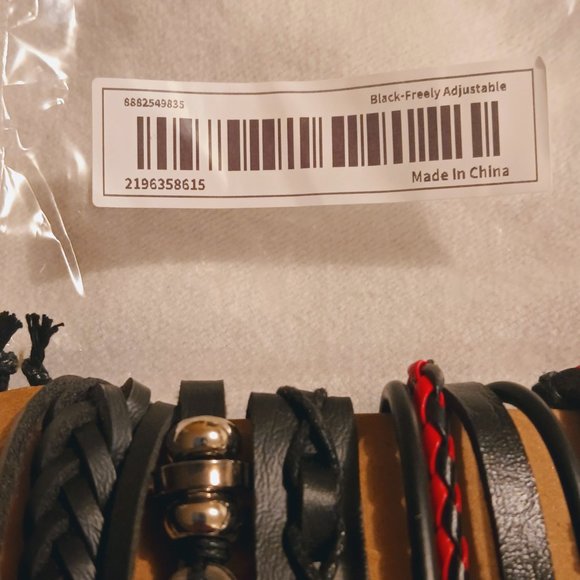 Multi Level leather bracelet features figure 8 and Money sign - Picture 2 of 6